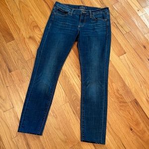 Lucky Brand Charlie Skinny Jeans . Size 4/27. Dark Wash Slightly Distressed. EUC